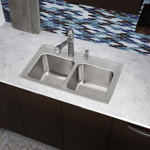 Elkay double-bowl stainless steel sink installed in a light countertop