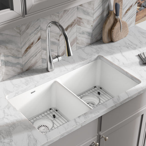 White double-bowl quartz kitchen sink installed in a light countertop