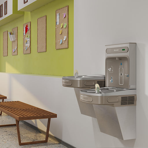 Elkay bi-level bottle filling station and drinking fountains in a school hallway