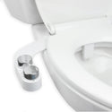 Brondell FSR-25 white FreshSpa installed beneath a toilet seat, with control knobs and nozzle visible
