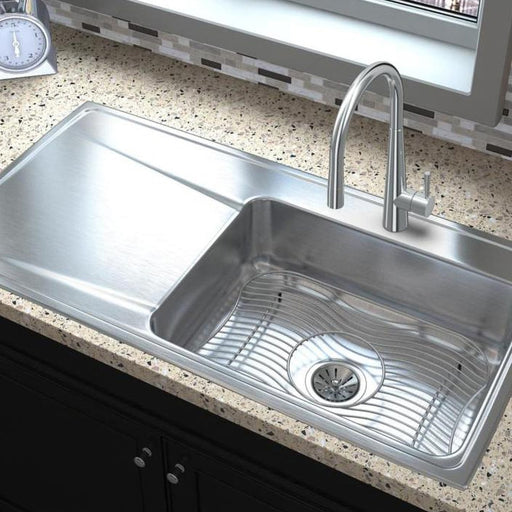 Large stainless steel kitchen sink with an integrated drainboard