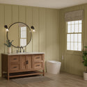 Brondell KBT-900 Coit smart toilet installed beside a wood vanity in a green bathroom