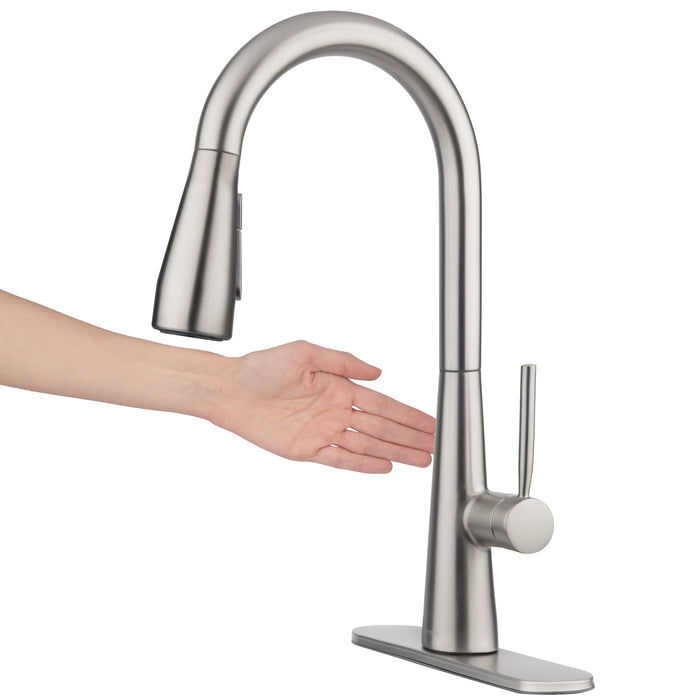 Brondell KFS15-SRS hand waving beside the sensor on the Jema touchless faucet in spotclear stainless