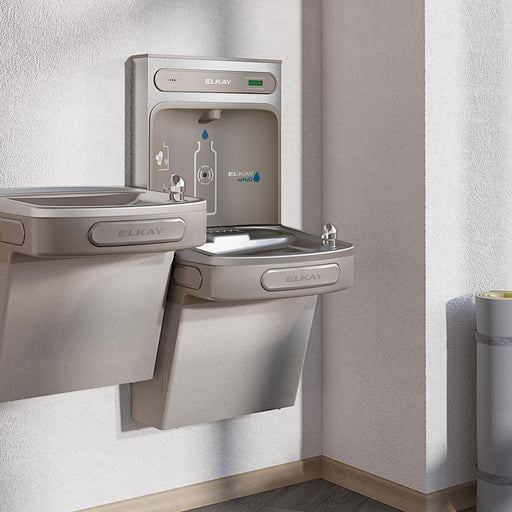 Elkay bi-level bottle filling station and drinking fountains installed on a wall