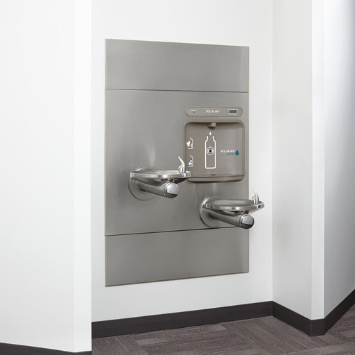 Elkay bottle filling station and drinking fountains installed in a recessed wall opening