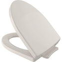 The TOTO SS214#12 is a Soiree collection SoftClose elongated toilet seat and lid in Sedona Beige