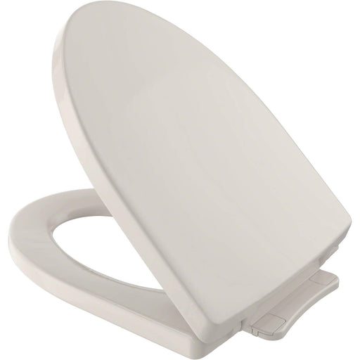 The TOTO SS214#12 is a Soiree collection SoftClose elongated toilet seat and lid in Sedona Beige