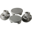 Four white TOTO WASHLET seat bumpers and mounting pieces