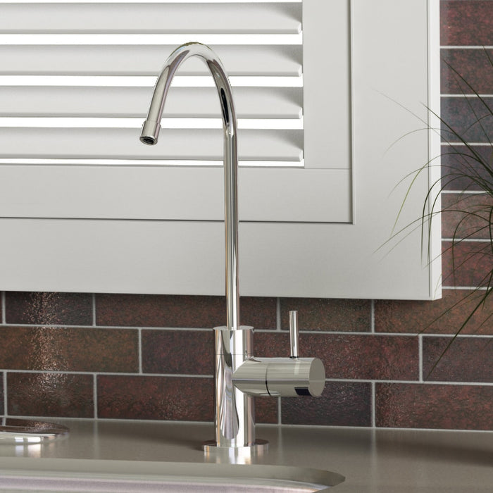 Chrome drinking water faucet with knob; under-sink filter tubing connection visible